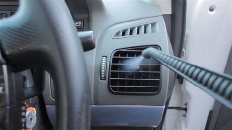 Air Conditioning Vent Cleaning with Steam Vapour in a Car Interior ...