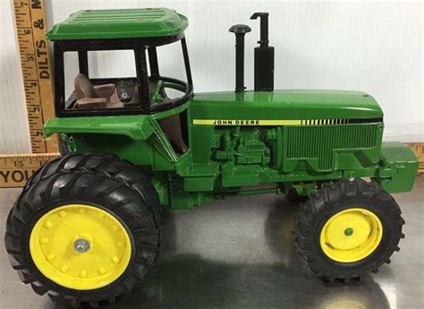 ERTL John Deere With ERTL Trailer - Sherwood Auctions