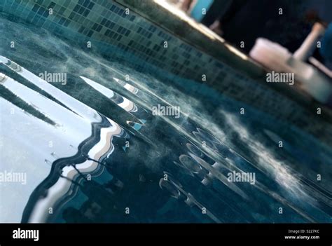 Swimming pool water reflection Stock Photo - Alamy