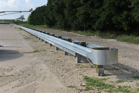 MASH TL-3 Evaluation of W-Beam Guardrail Median Barrier with Rub Rail - Roadside Safety Pooled Fund