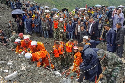 Hopes fading in China for 118 still missing day after landslide | ABS-CBN News