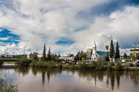 Scenery of Fairbanks city downtown over Chena River in Alaska, USA.