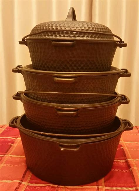 four oval casserole dishes stacked on top of each other