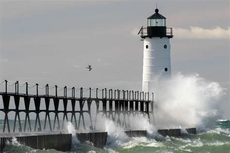 Manistee lighthouse waves and ice