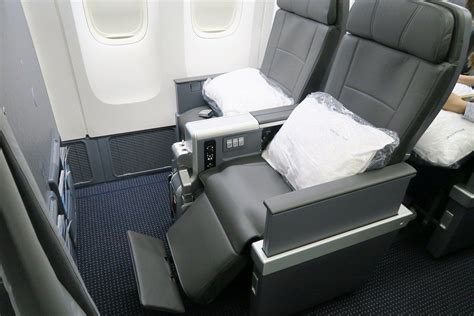 Review: AA (777-200) Premium Economy LHR to MIA - The Points Guy | Economy seats, American ...