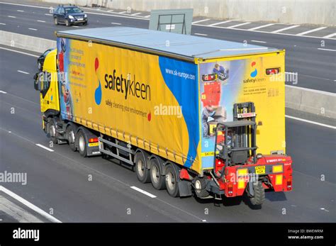 Fork lift truck carried on back of articulated lorry Stock Photo: 32904360 - Alamy