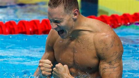 Swimming: Caeleb Dressel makes history with three world golds in one night