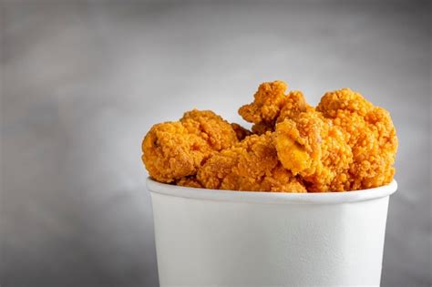 Premium Photo | Crispy fried chicken in the bucket Chicken bucket