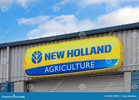 New Holland Agriculture Logo at Dealership with Beautiful Sky Editorial ...