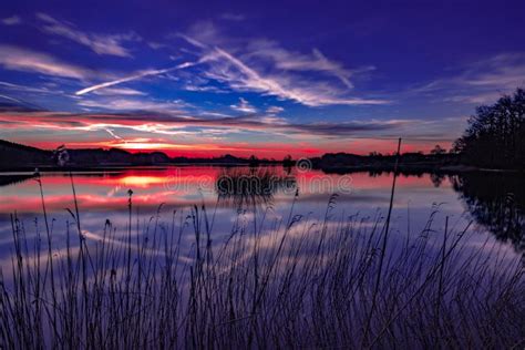 A Beautiful Sunset at a Calm and Peaceful Lake - Colorful Sky Stock ...