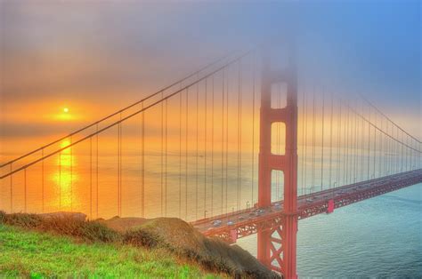 Golden Gate Bridge In Fog At Sunrise by Mitchell Funk