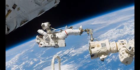 Watch 2 NASA Astronauts Take a Spacewalk Outside the ISS | Inverse