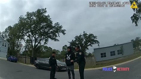 Bonkers moment Florida cop opens fire on handcuffed, unarmed suspect in ...