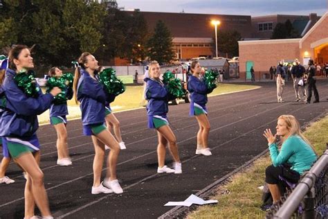 Cheer coach has teams bond - The Observer