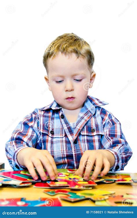 Boy with puzzle stock image. Image of cute, indoors, caucasian - 7158021