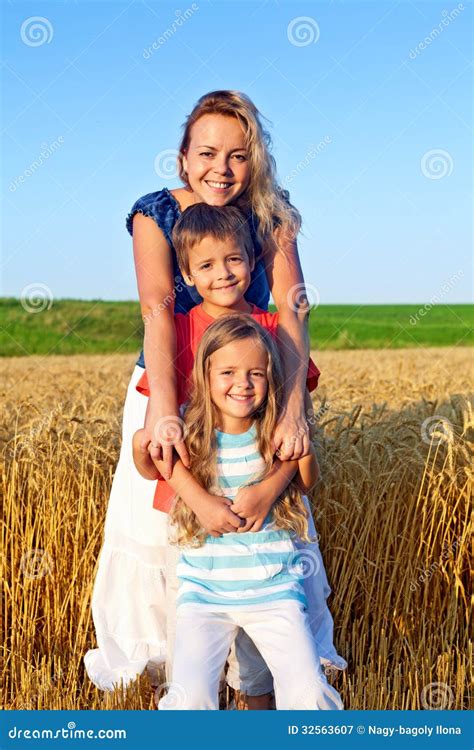 Happy family outdoors stock image. Image of relaxing - 32563607