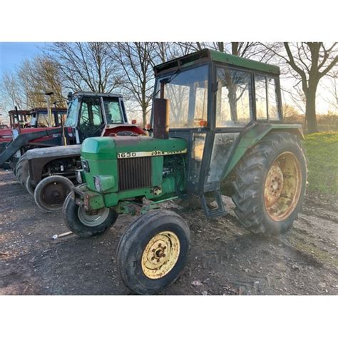 John Deere 1630 tractor, 1978. 4616 hours showing. Runs. V5 and key in ...