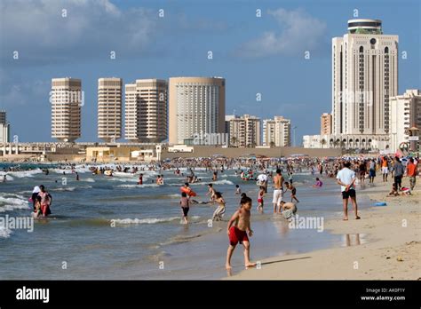 Tripoli, Libya. Mediterranean Beach Scene, Summer, Corinthia Hotel, Dhat al-Imad Office ...