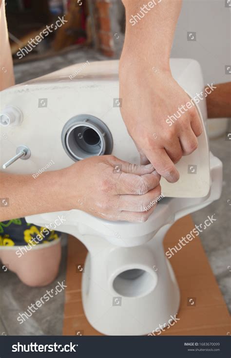 Installing White Ceramic Twopiece Flush Toilet Stock Photo (Edit Now) 1683670099