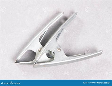 Metal Spring Clamps Isolated on Grey Stock Photo - Image of vintage, table: 267477094