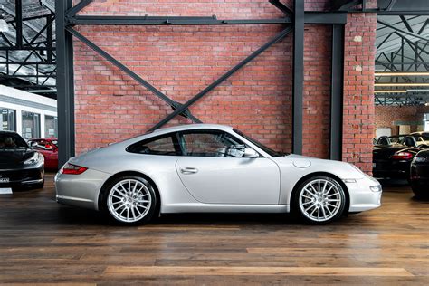 Porsche 911 Carrera silver coupe (2) - Richmonds - Classic and Prestige ...