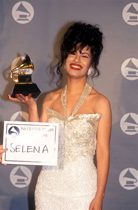 This is a picture of Selena winning a grammy. I like this picture because its one of the ...