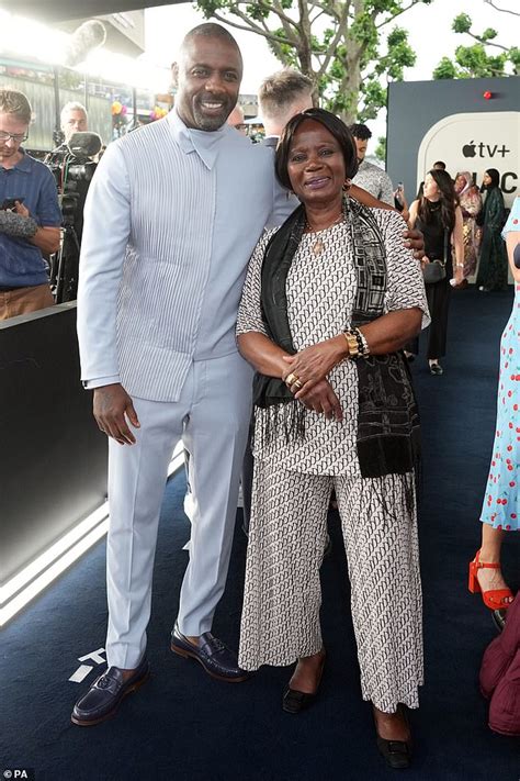 Idris Elba looks dapper in a quirky jacket as he joins his mum at the ...