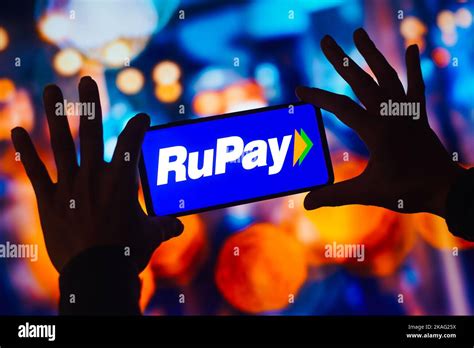 In this photo illustration, the RuPay logo is displayed on a smartphone ...