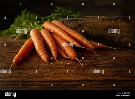 Raw carrots table hi-res stock photography and images - Alamy