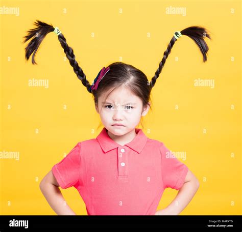 closeup angry little girl face Stock Photo - Alamy