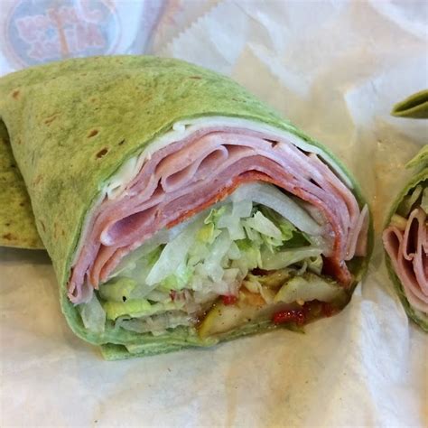 Jersey Mike's Subs' Original Italian, in a spinach wrap. Provolone, ham, prosciuttini ...