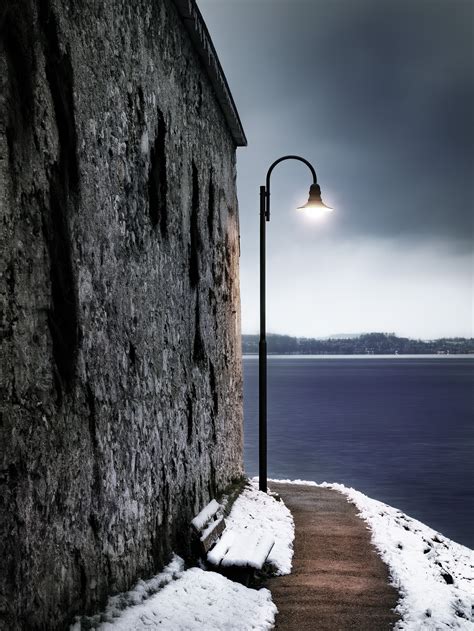 Lamp Post Near Body Of Water · Free Stock Photo