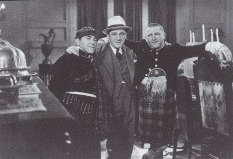 A behind the scenes shot of comic legends Moe, Shemp and Curly Howard ...