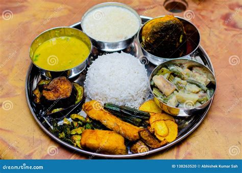 Traditional Indian Food , Bengali Food Thali , Rice , Dal , Fish, and Vegetables. Stock Photo ...