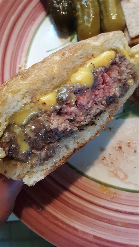 Classic ground chuck and ground brisket with yellow American on a toasted ciabatta roll : r/burgers