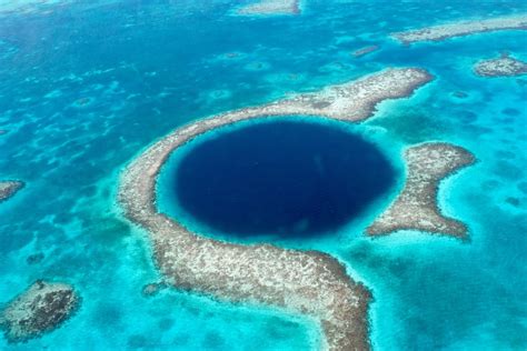 The Great Blue Hole in San Pedro, Belize is a circular in shape over 984 feet across and 410 ...