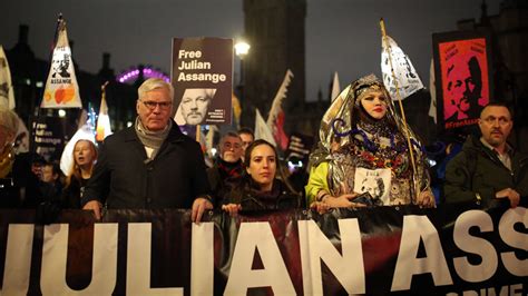 Julian Assange supporters participate in London 'night carnival' to ...