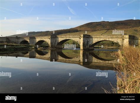 The stone arched bridge over the River Wharfe at Burnsall in Upper Wharfedale, Yorkshire Dales ...