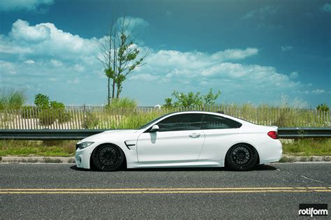 Sleek White BMW M4 Coupe With Subtle Custom Touches and Black Rotiform Rims — CARiD.com Gallery