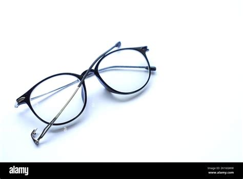 black color broken old glasses isolated on white Stock Photo - Alamy