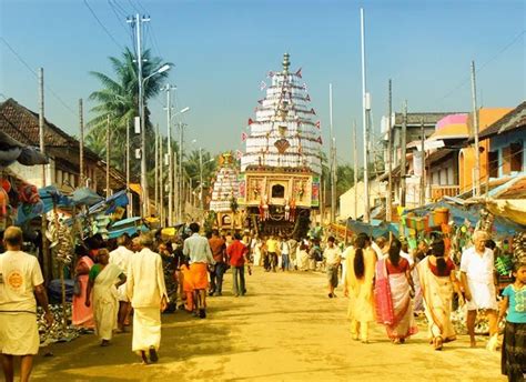 A huge chariot is being drawn through the streets of Kalpathi ...