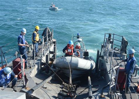 A rigid hulled inflatable boat (RHIB) is launched from - NARA & DVIDS Public Domain Archive ...