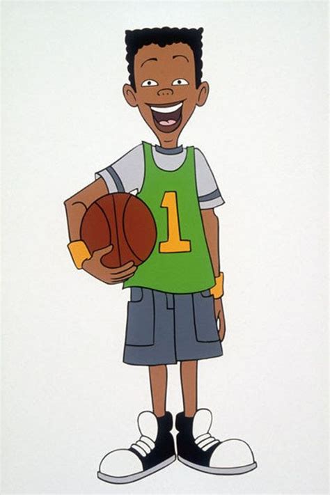 a cartoon character holding a basketball and wearing a green shirt