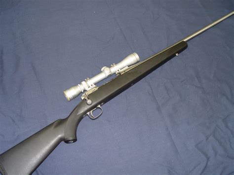 Savage Arms Corp. Model 116 Stainless .300 win mag Scope LOOK!