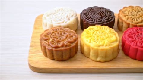 colourful Chinese moon cake with mixed flavour on wood plate 5562489 ...