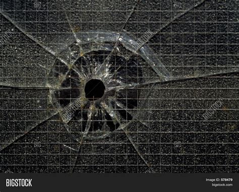 Bullet Hole Through Glass Stock Photo & Stock Images | Bigstock