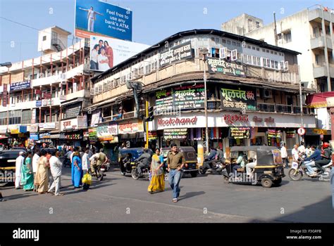 Traffic in the morning at laxmi road crossroad ; Pune ; Maharashtra ...