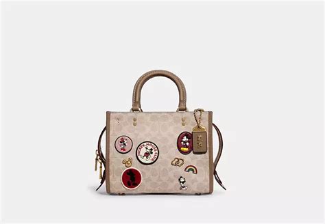 COACH® Outlet | Disney X Coach Rogue Bag 25 In Signature Canvas With Patches