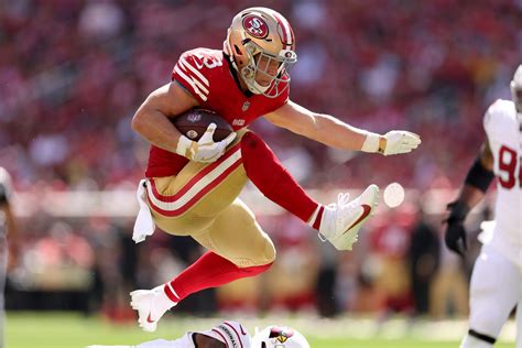 McCaffrey makes history, Purdy delivers as 49ers dominate Cardinals to go 4-0