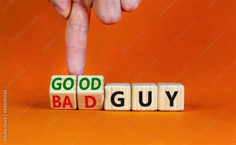 Good or bad guy symbol. Businessman turns cubes and changes concept ...